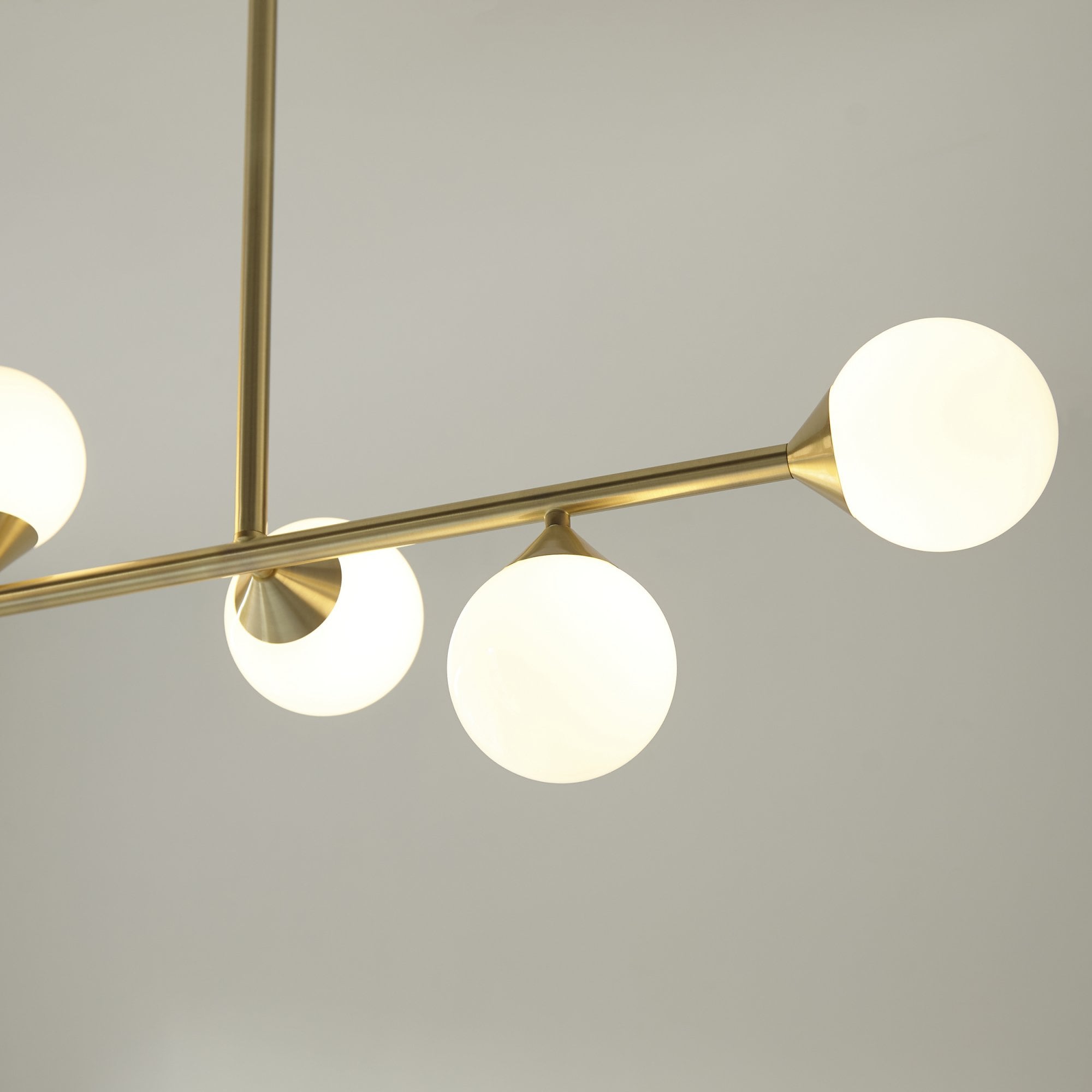 Modern Linear 5 Light Ceiling Pendant Light In Satin Brass With White Glass Shades