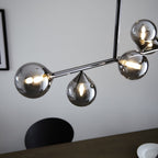 Modern Linear 5 Light Ceiling Pendant Light In Black Chrome With Smoked Glass Shades