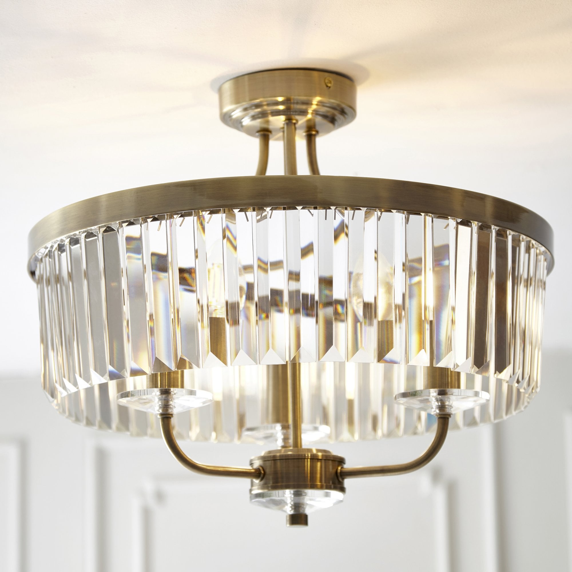Elegant 3 Light Semi Flush Light In Antique Brass With Clear Cut Crystal Glass