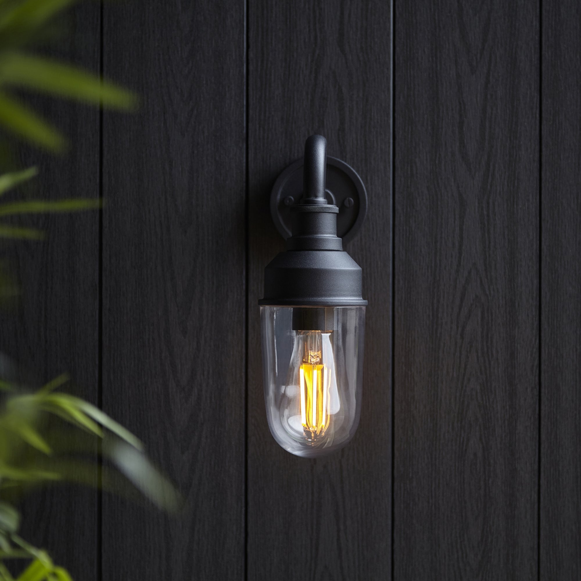 Classic Curved Arm Exterior Wall Light In Matt Black Finish With Clear Glass Shade IP44