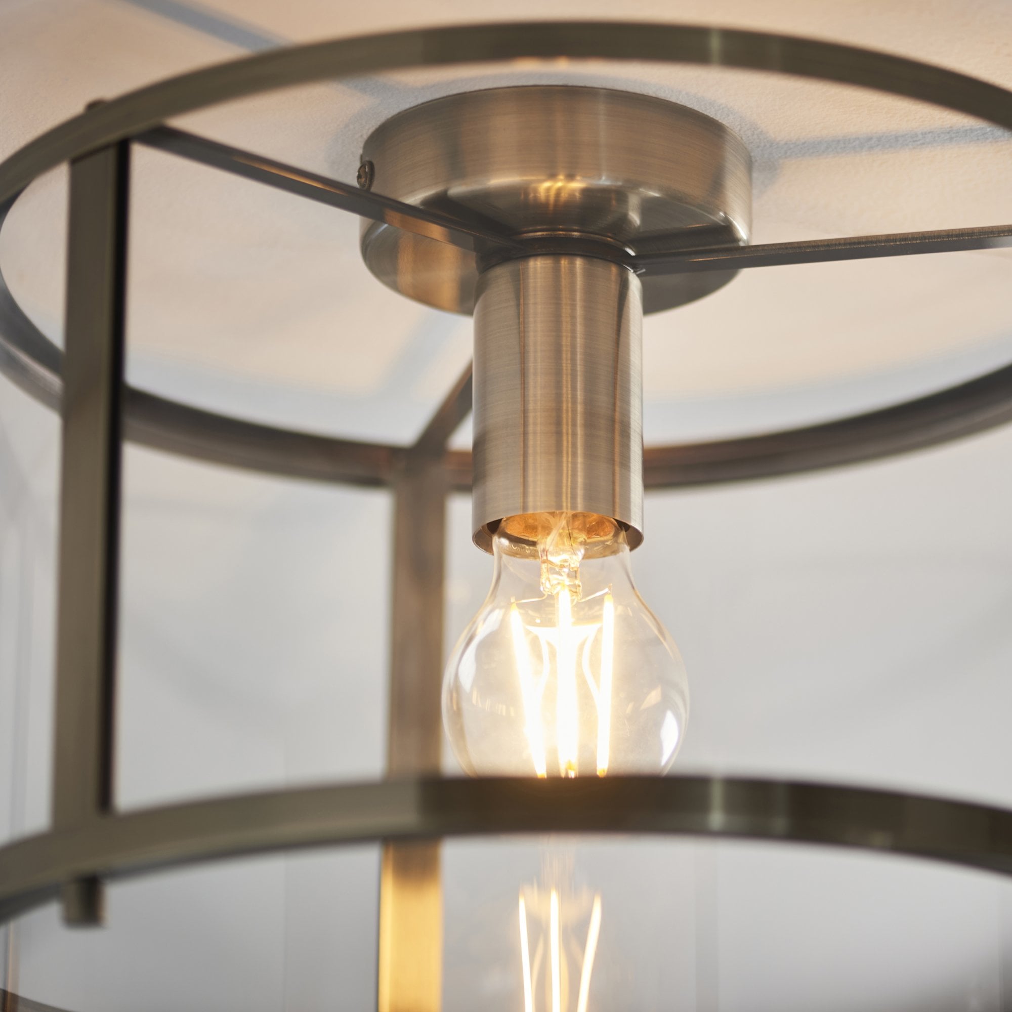Hopton Timeless Flush Ceiling Light In Antique Brass With Clear Glass 103112
