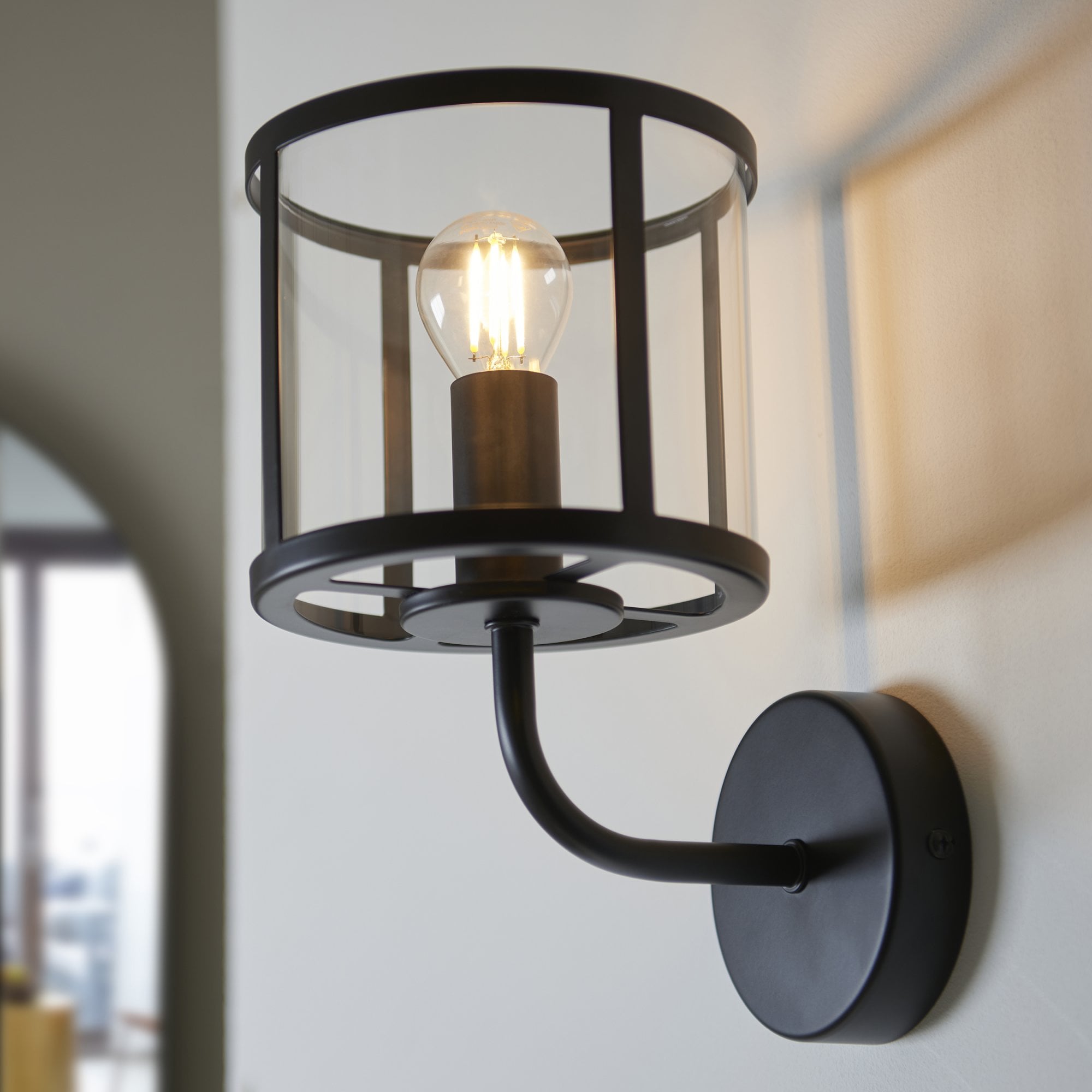 Hopton Timeless Wall Light In Matt Black With Clear Glass 104193