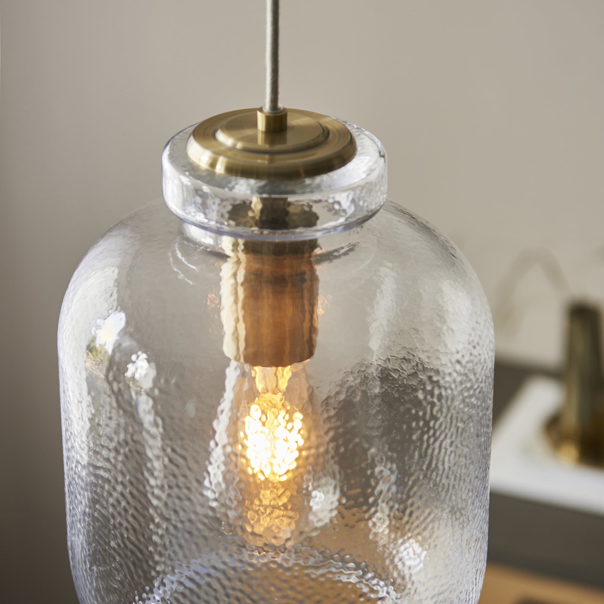 Lyra Modern Ceiling Pendant Light In Antique Brass With Clear Textured Glass Shade 106923