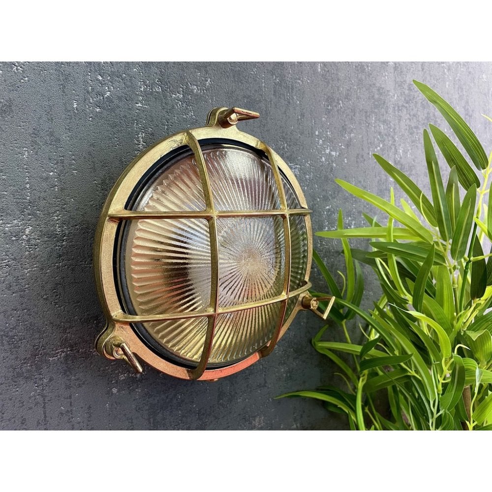 Jetty Small Coastal Round Wall Lantern In Raw Brass Finish
