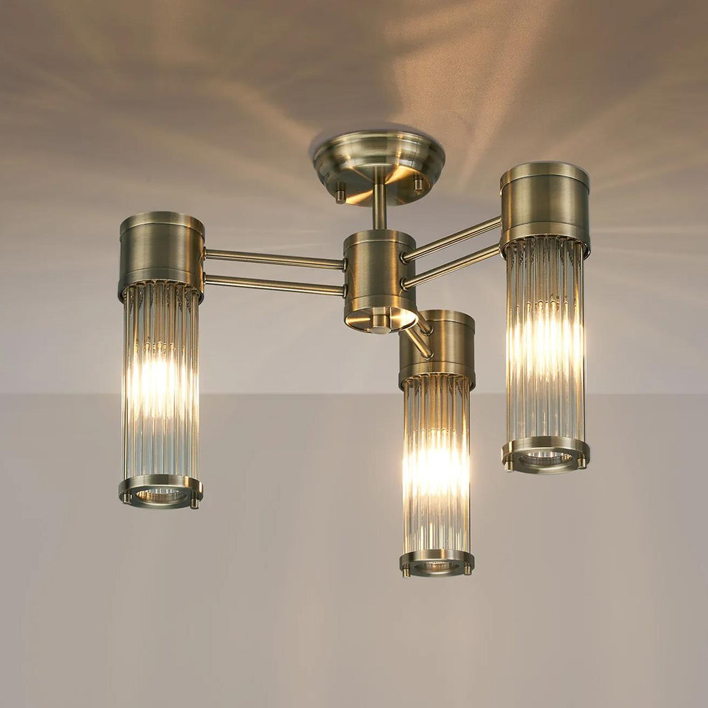 Pillar 3 Light Bathroom Semi Flush Ceiling Light In Antique Brass And Clear Glass Rods IP44 E14