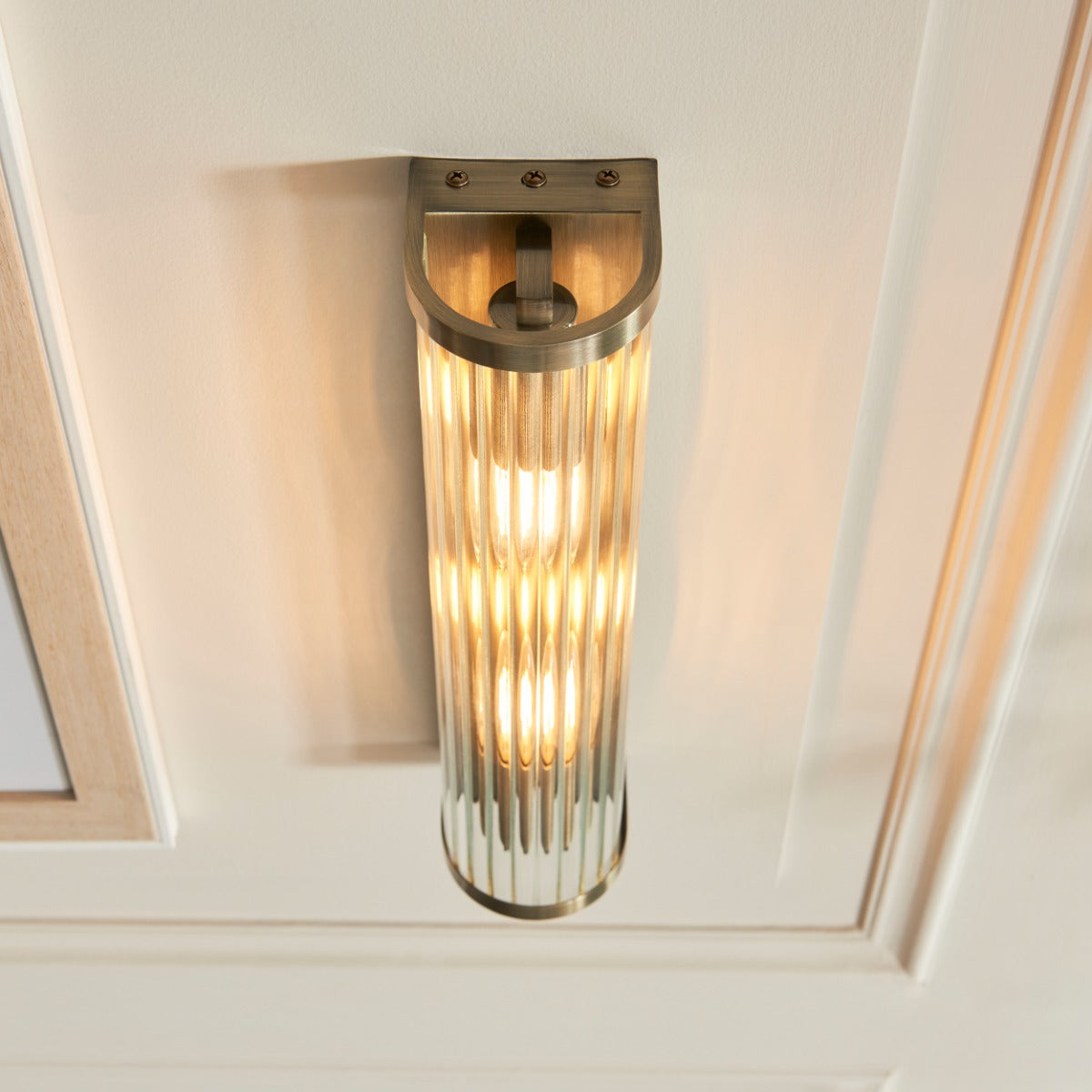 Ridgeton Twin Wall Light In Antique Brass With Ribbed Glass 118597