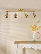 Nathaniel 4 Light Bar Spotlight In Aged Brass Finish NAT8442