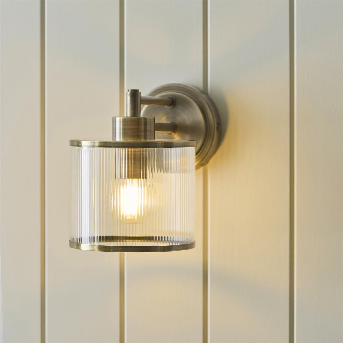 Ridgeton Single Wall Light In Antique Brass With Ribbed Glass 120144